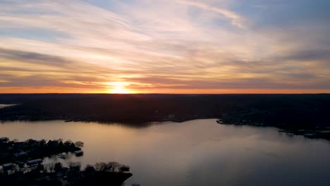 Missouri-Sunset-over-Beautiful-Ozarks-Lake-Reservoir,-Aerial-Establishing