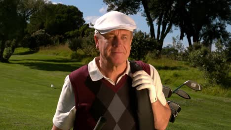 mature golfer walking on the golf course