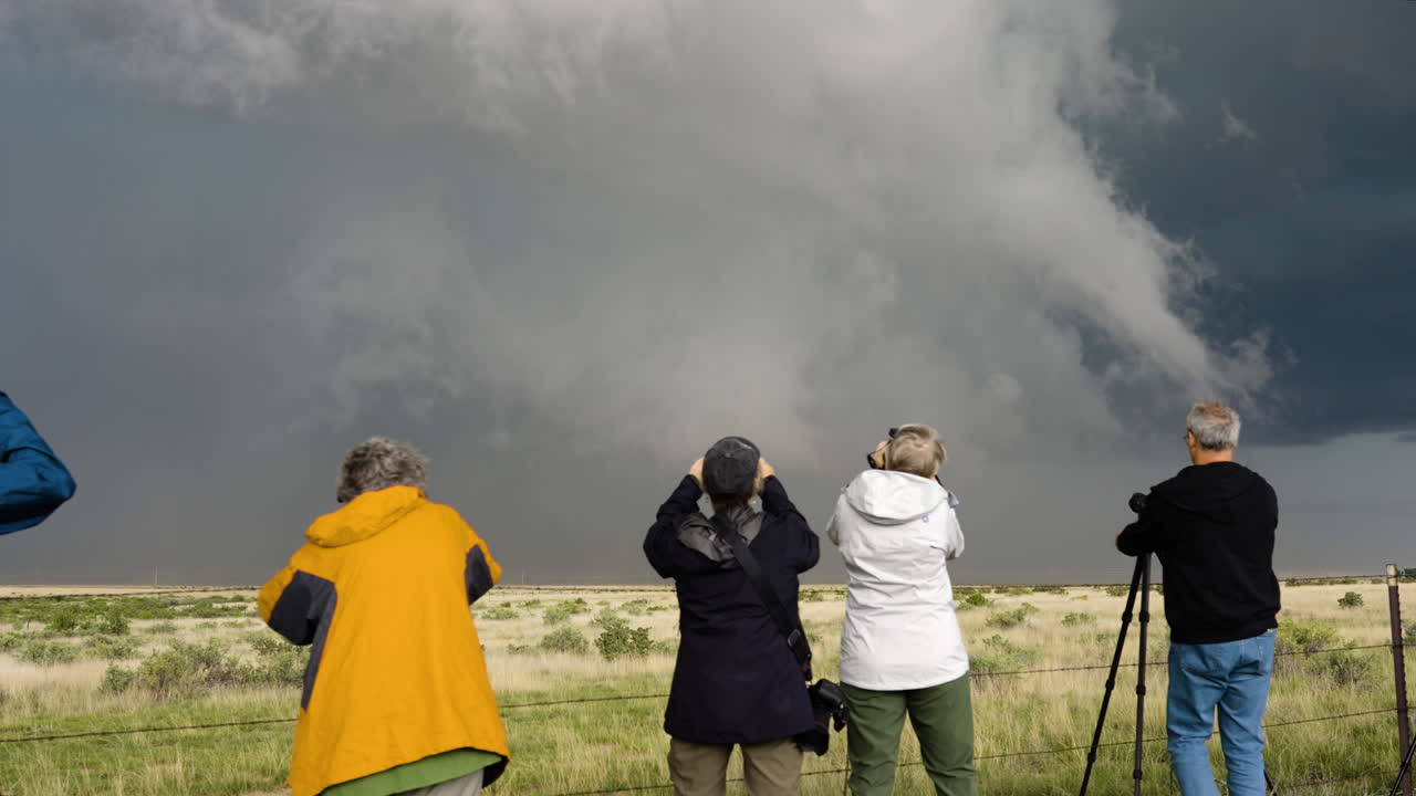 Storm Chasing Photography Tourists Watch A Big Storm Move Closer