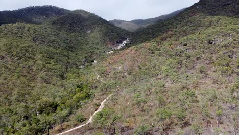 Aerial-Over-Dry-Sclerophyll-Forests-Near-Emerald-Falls-Creek,-Cairns