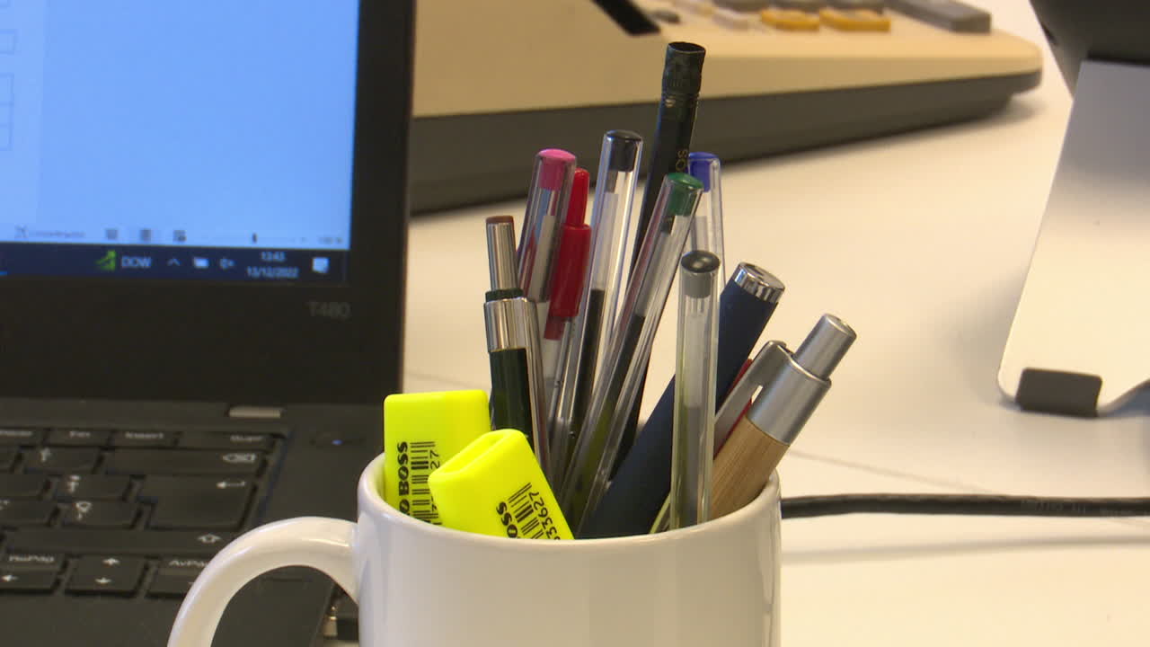 Office Desk with Pens and Pencils