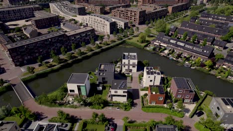 urban canal around modern contemporary housing in residential neighbourhood leidsche rijn of dutch city utrecht