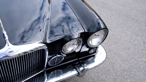 old black american car headlights, old american muscle car, desoto diplomat, car shiny headlights, american car hood, black car