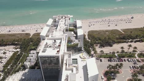 aerial flight over luxury penthouse condos on sunny miami beach