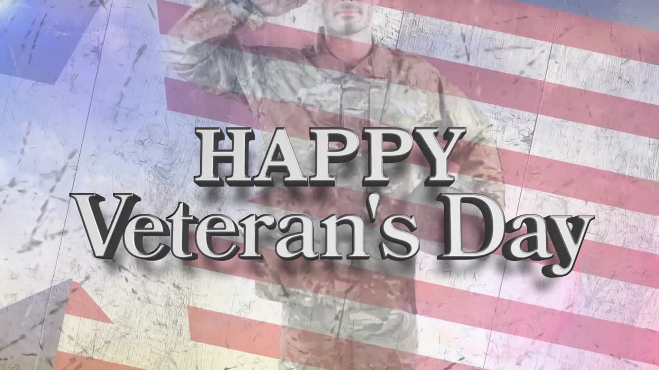 Animation of happy veteran's day text over mixed race male soldier and american flag