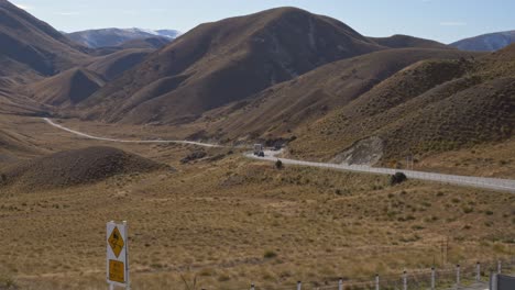 lindis pass - scenic route on the south island in new zealand - wide shot