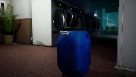 blue plastic container in a laundry room