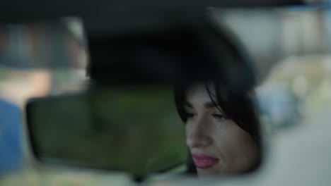 confident businesswoman driving her car, dressed in elegant business attire, showcasing independence and professionalism in a modern vehicle interior