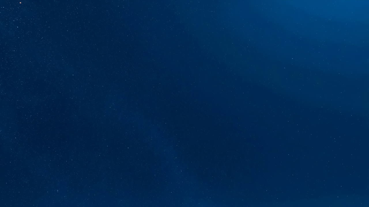 A serene dark blue night sky filled with countless stars