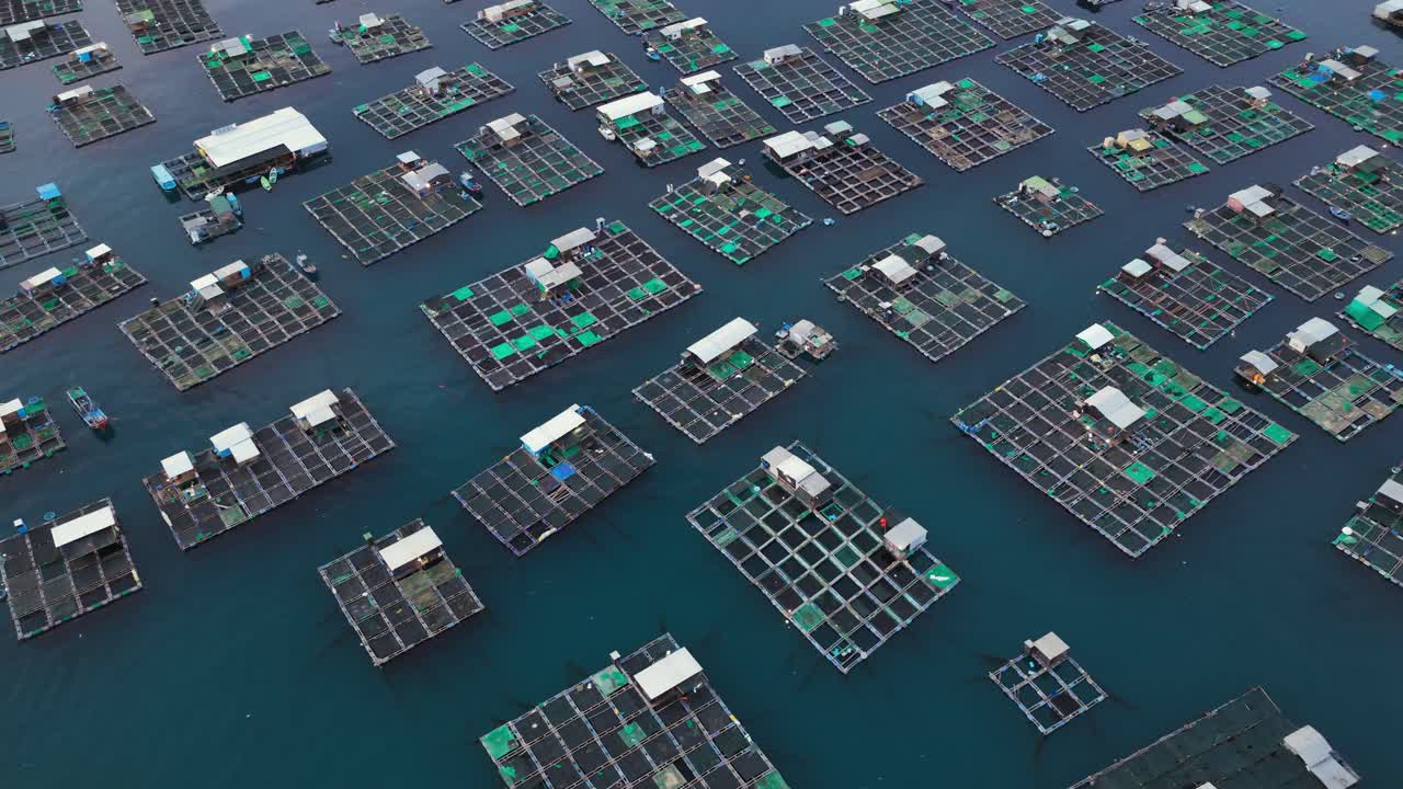 Drone view hundred of fish farms on the side of Tri Nguyen island, Nha Trang city, Khanh Hoa province, central Vietnam