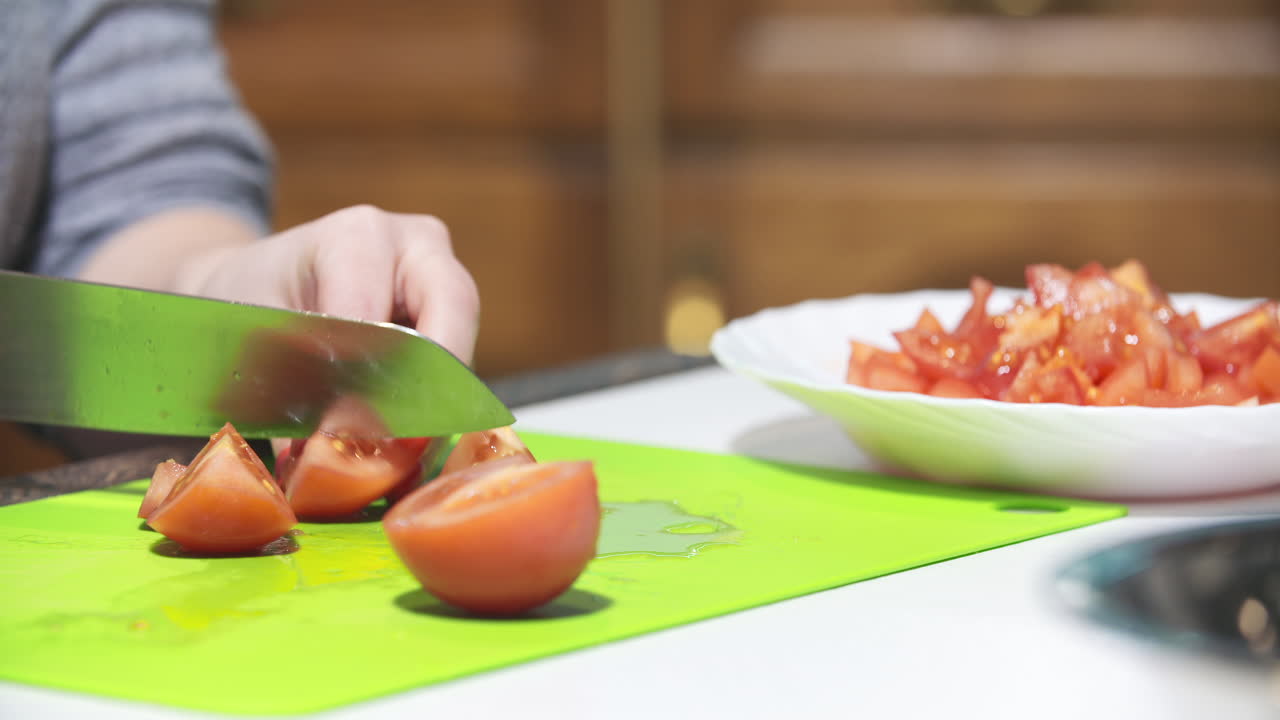 Cutting Tomatoes into Quarters Close-Up