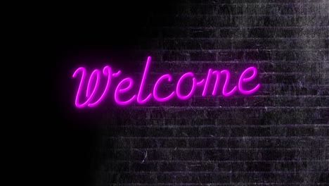 animation of neon welcome text over black brick wall