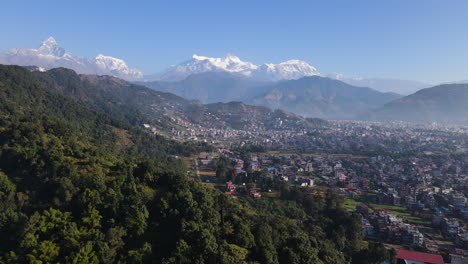 idyllic view of mountains and city in pokhara, nepal - aerial drone shot