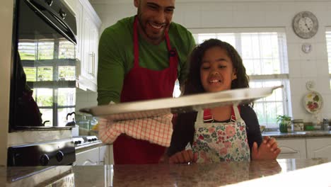 Family-making-Christmas-cookies-at-home