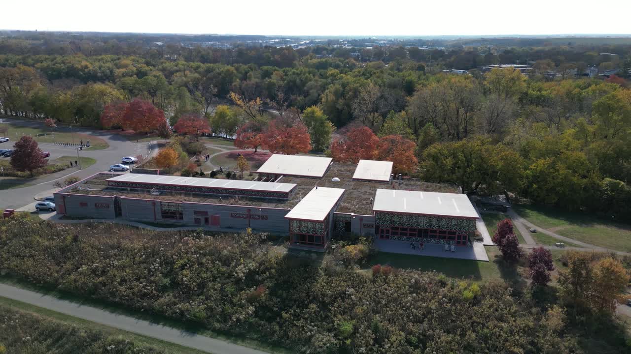 Aerial orbit of Audubon society metro park building, Columbus, Ohio