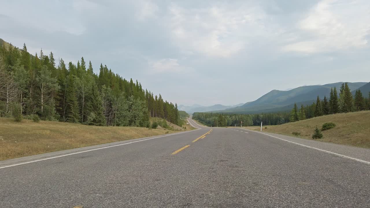 Mountain road on an overcast day crab Rockies Kananaskis Alberta Canada
