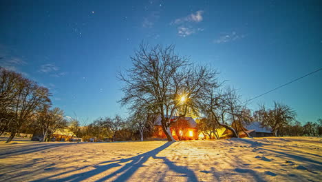 moon and stars so bright as to cast shadows on the snowy landscape - time lapse