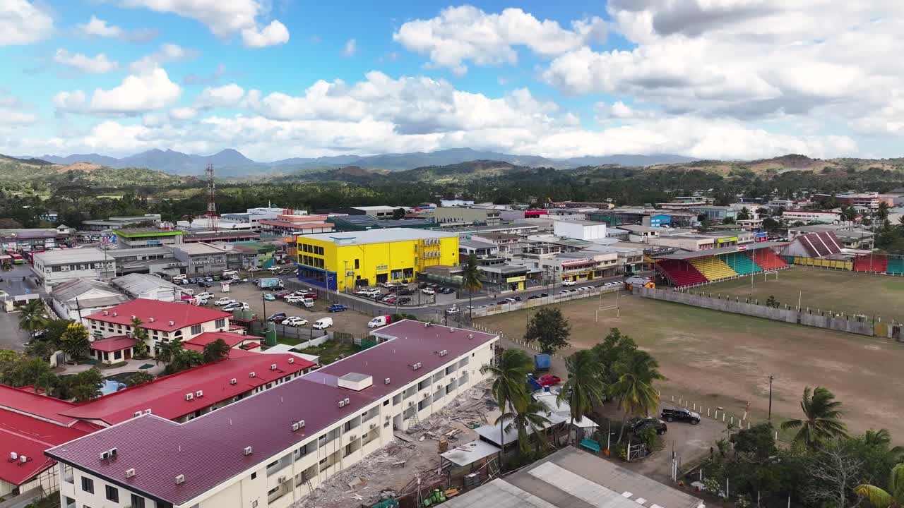 Subrail Park Stadium And Soccer Field In Town Of Labasa, Vanua Levu Island, Fiji. ascending drone shot