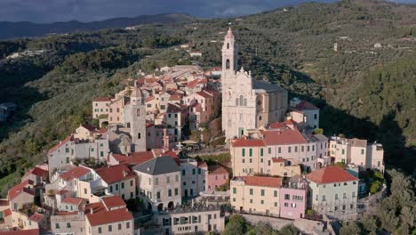 Aerial-view-of-catholic-church-San-Giovanni-Battista-in-Cervo,-Liguaria,-Italy