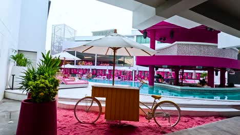 pink tropical poolside bar and lounge