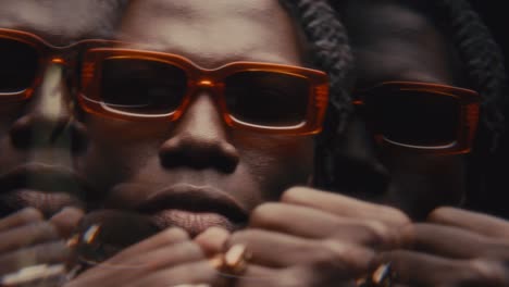 kaleidoscopic effect of stylish black man enjoying rap music and dancing