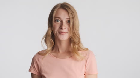 caucasian woman thinking and agreeing on camera.