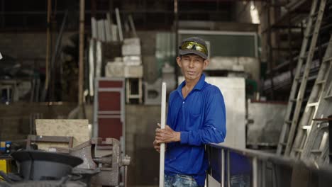 portrait of a worker in a metal workshop