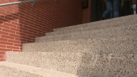 woman walking upstairs