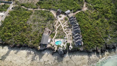 kusini beach bungalow resort with pool in east zanzibar island tanzania africa, aerial top view shot