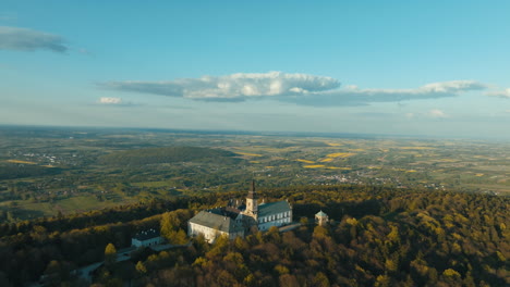 aerial view of a monastery and surrounding landscape