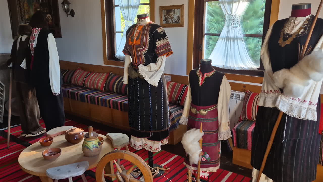 Old Balkan national traditional costumes and clothes, tilt up