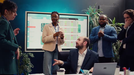 Joyful-supervisor-accidentally-kissing-his-employee-in-excitement