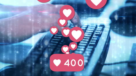 animación de iconos de corazones y números de las redes sociales sobre el teclado de la computadora
