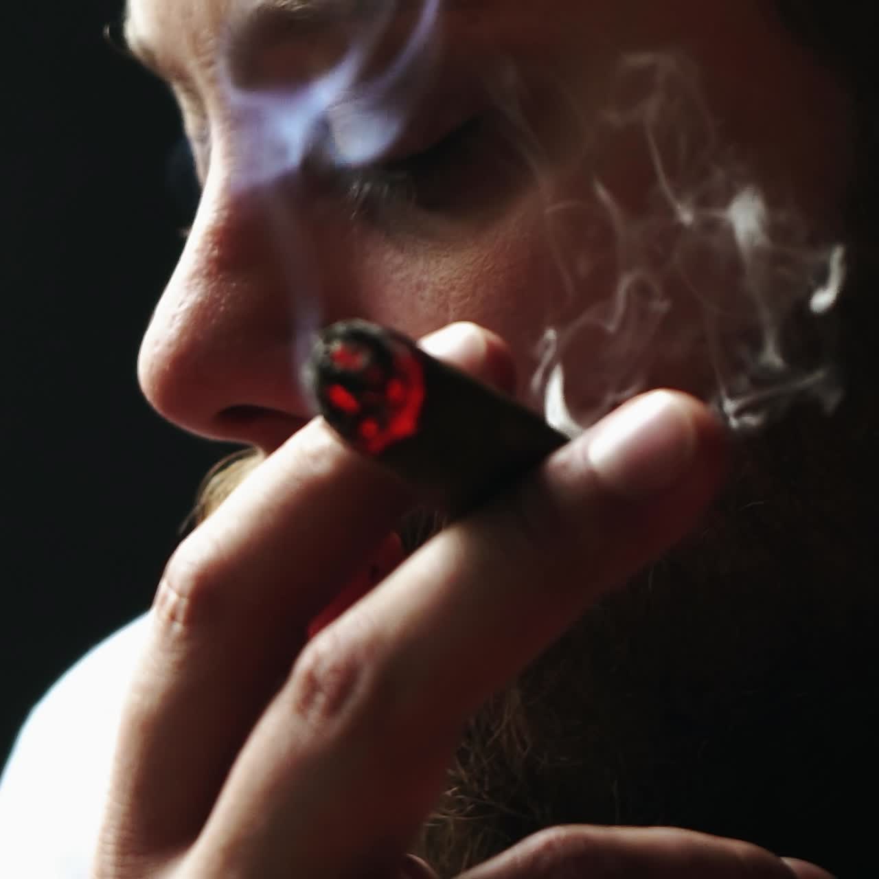 Brutal man smoking cigar