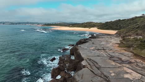 Rocky-Coastline-at-High-Noon:-Spoon-Bay's-Aerial-Landscape-in-Full-Glory