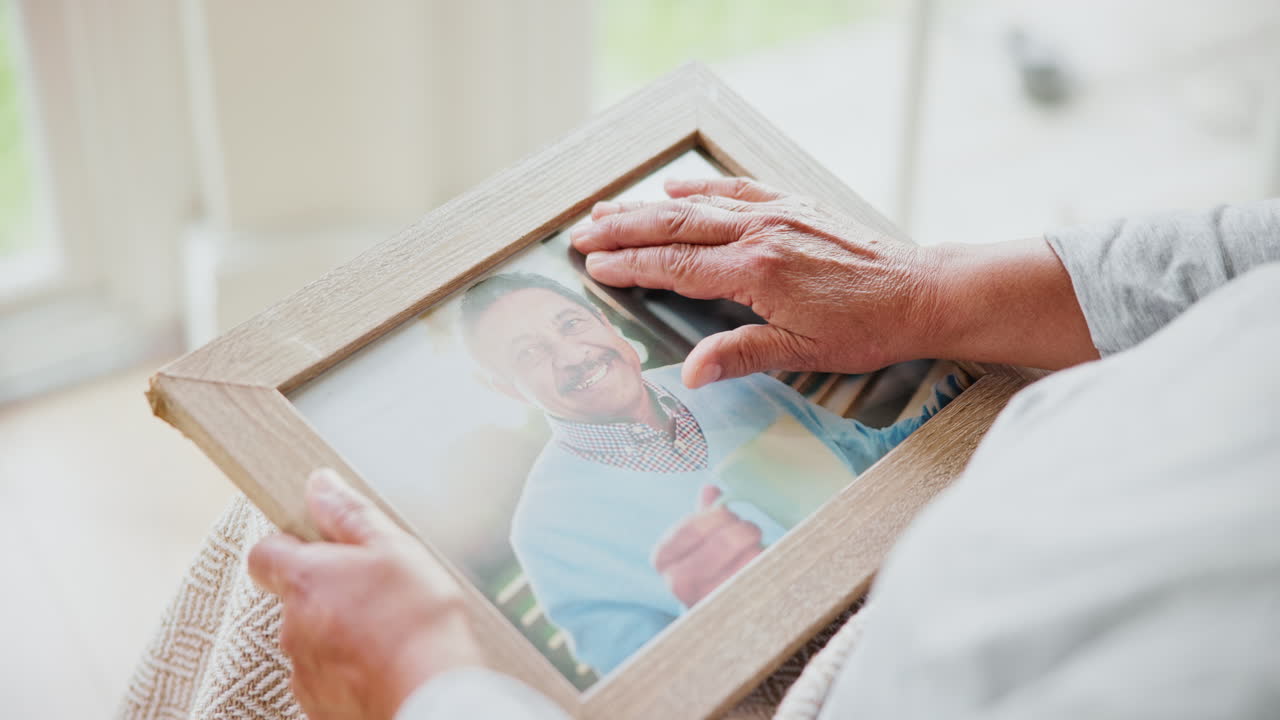 Photo frame, hands and senior person