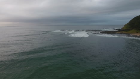 cinematic aerial flying along coast of east london south africa