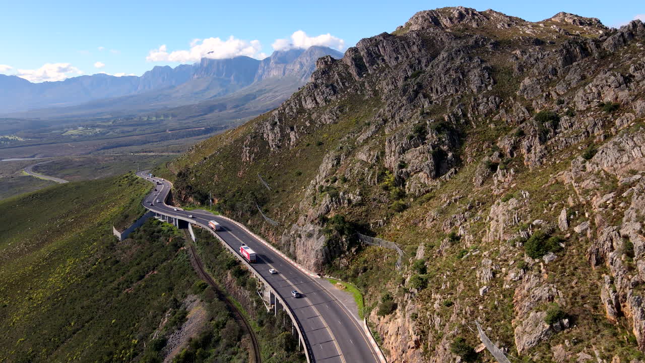Vehicle traffic on dangerous Sir Lowry's Pass N2 over Hottentots Holland, aerial