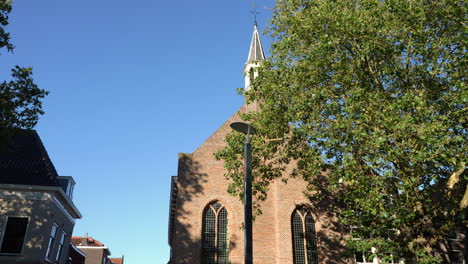 brick facade of evangelical lutheran community church in gouda old town, netherlands