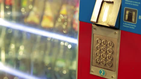 person selecting item from vending machine