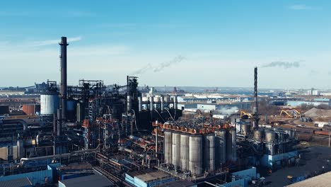 Aerial-Shot-of-Factory-Polluting-in-Industrial-Area