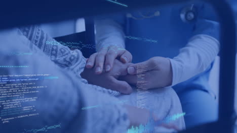 medical professional holding patient's hand with digital data overlay animation