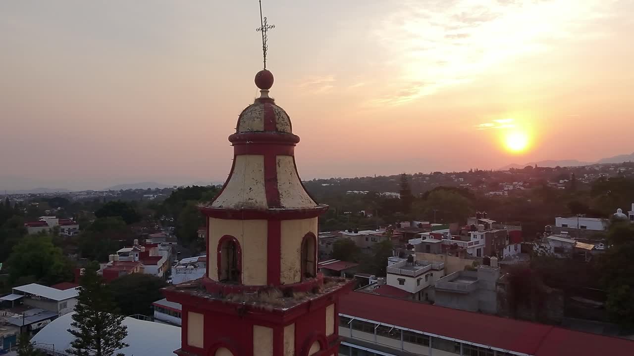 panoramic view at sunset of the Tlaltenango bell tower with the town at its feet
