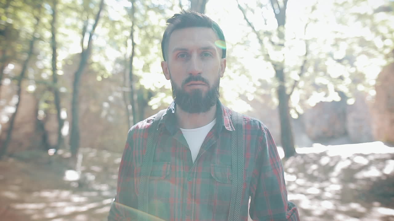 Man with beard in a forest