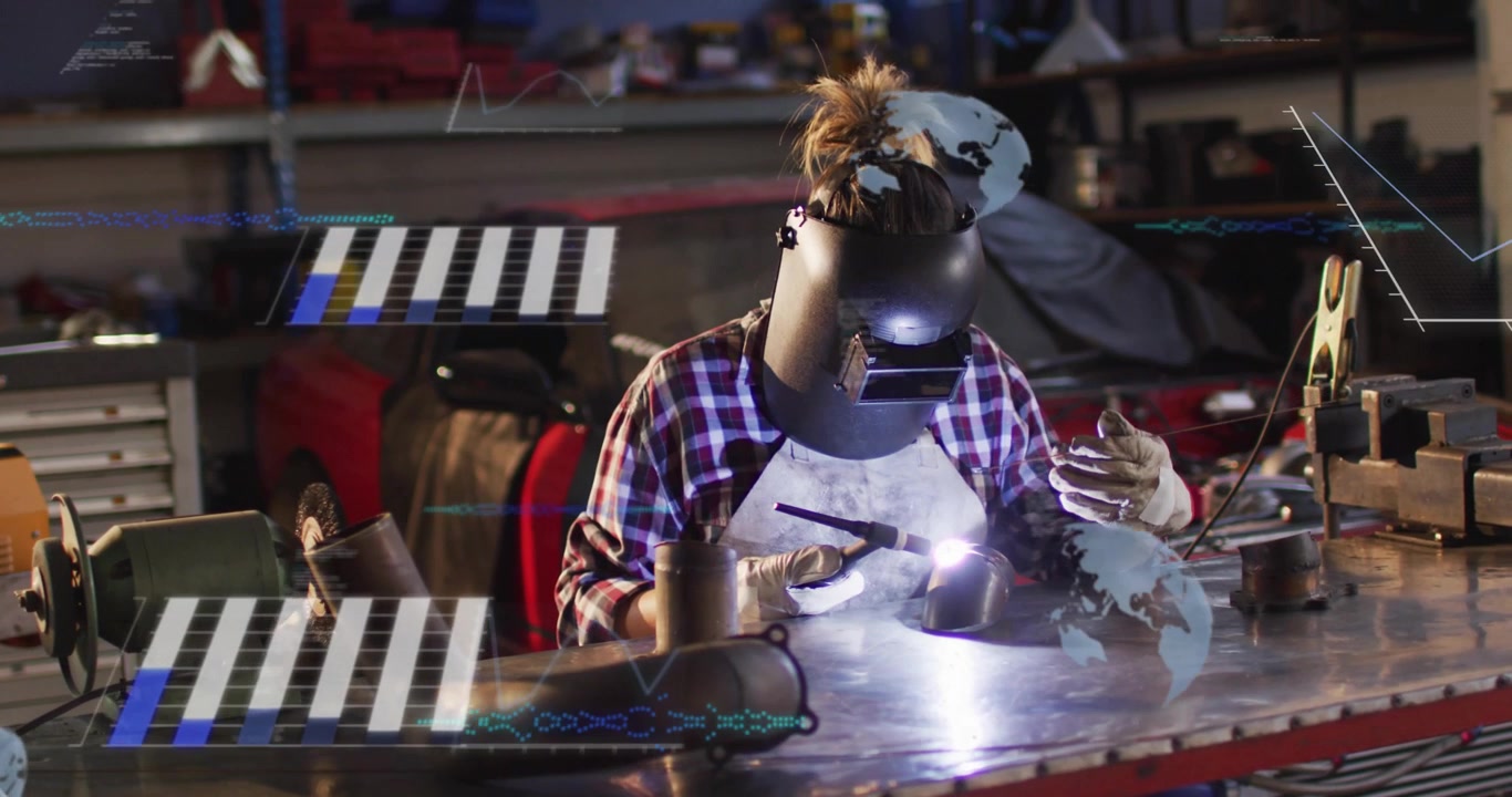 Woman welder fitting helmet, igniting torch and joining parts at shop, charts overlaying foreground
