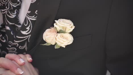 groom in tuxedo with boutonniere