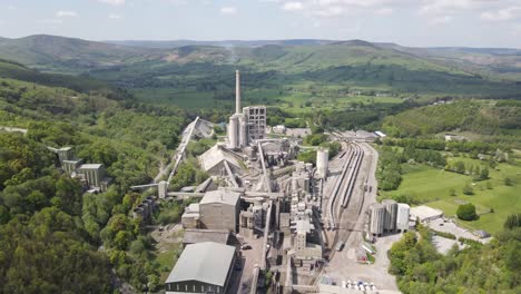 Aerial-drone-flight-over-Breedon-Hope-Cement-Works-with-a-view-of-the-surrounding-Peak-District