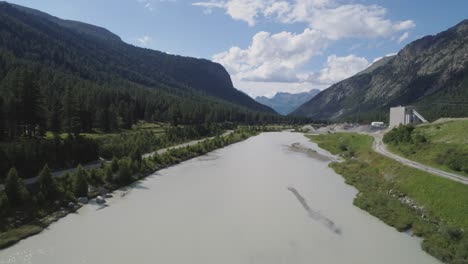 aerial of a river in a mountain valley