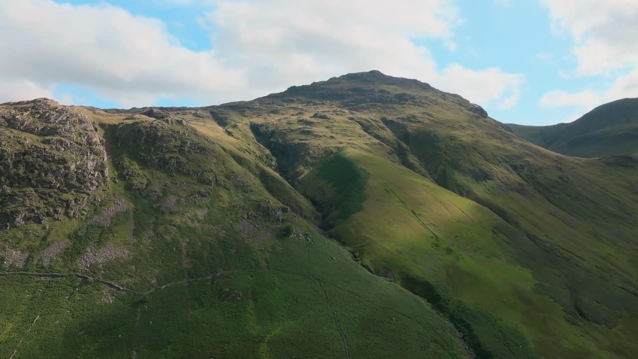 Rugged Mountain Pike Of Blisco With Pools Of Summer Sunshine. Great Langdale, Lake District, Cumbria, UK
