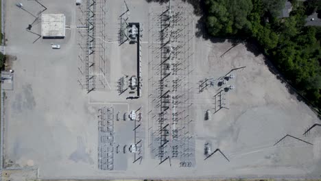 Aerial-View-Above-High-Voltage-Electricity-Supply-Power-Grid-Station